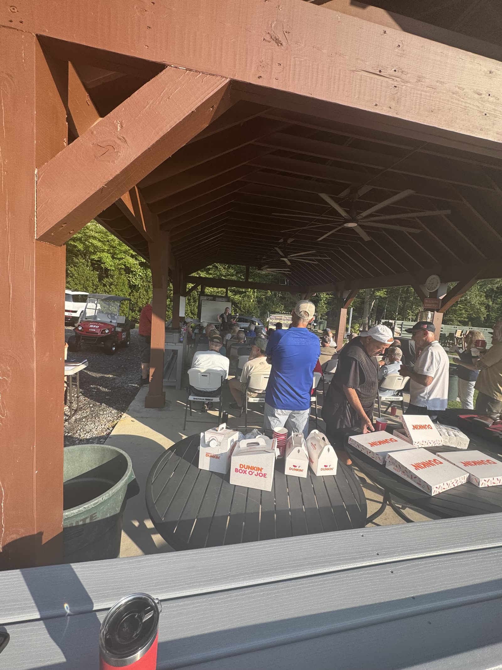 Shooters on the line at the Coffee & Clays Trap 101 session